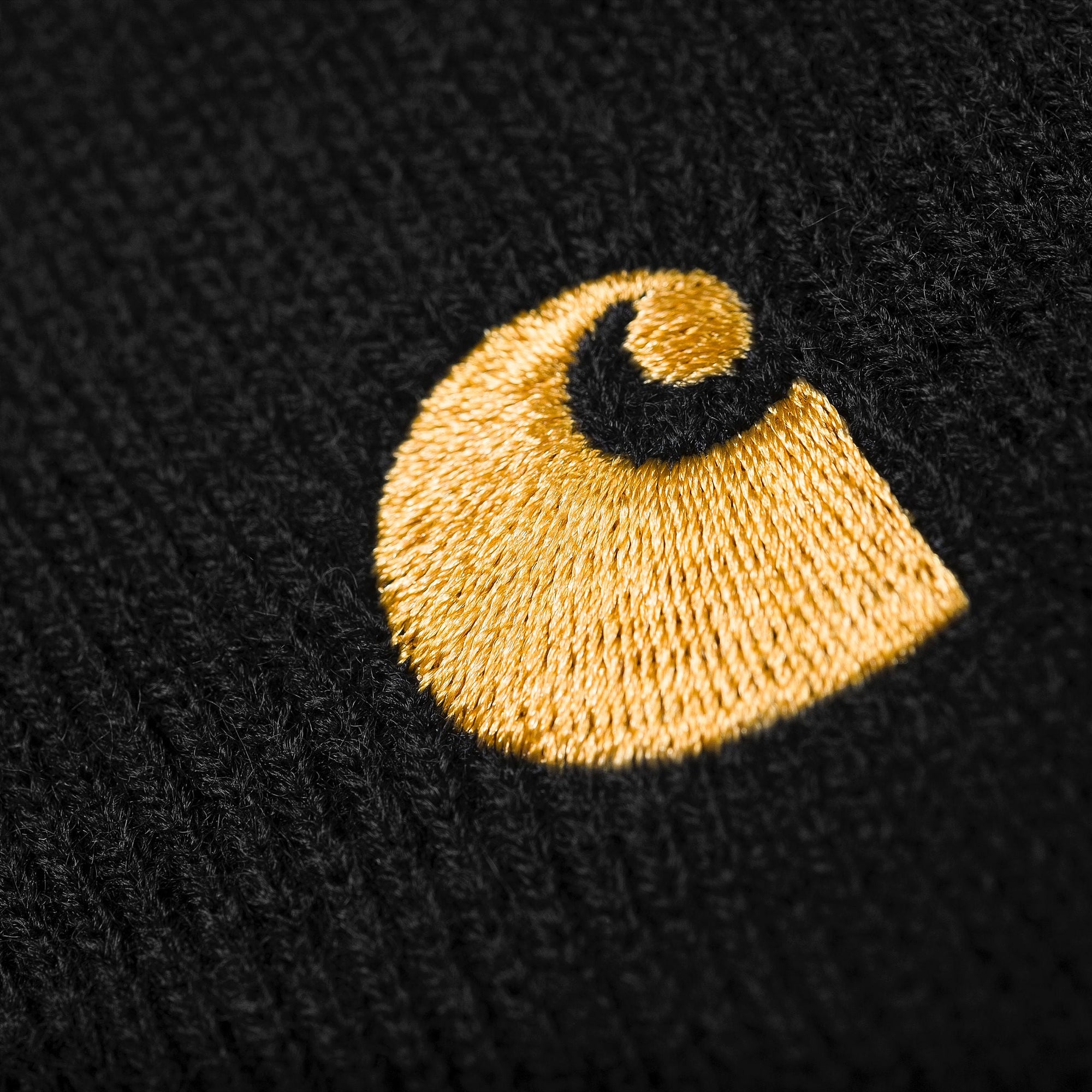 Carhartt cappellino a cuffia Chase Beanie 1026222 00F black-gold taglia unica